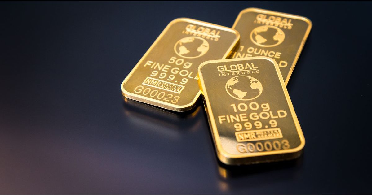 Stacked fine gold bars stamped 999.9, illustrating the gold whose tola price in Kathmandu is translated from the international dollar price at the rupee exchange rate