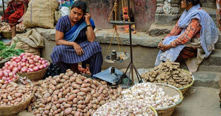 Women vegetable vendors at Asan Bazaar, Kathmandu, the micro-entrepreneurs who form the core borrowers of microfinance institutions like HLBSL