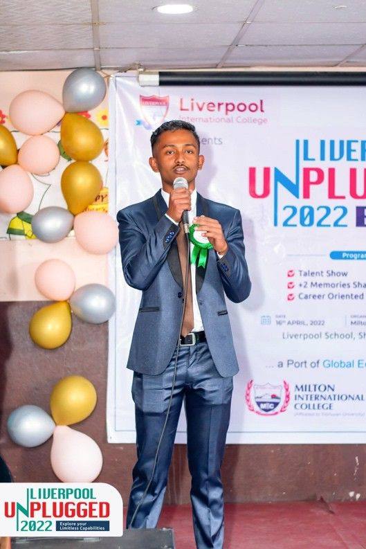 Shirjan on stage at Liverpool Unplugged 2022